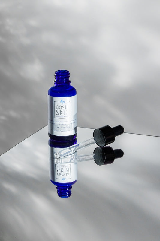 Vitamin C face serum bottle
Hyaluronic acid serum texture
Crysta Skin face serum application