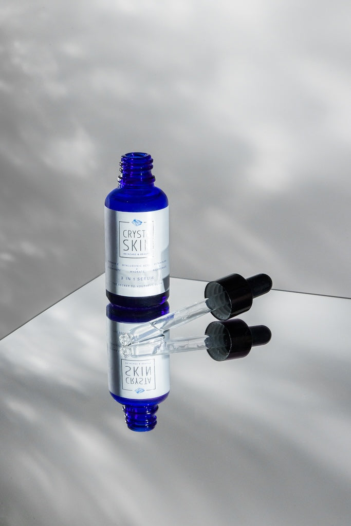 Vitamin C face serum bottle
Hyaluronic acid serum texture
Crysta Skin face serum application